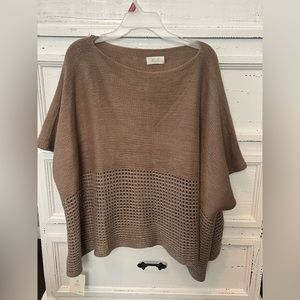 Brown top. Never worn and tags still on it